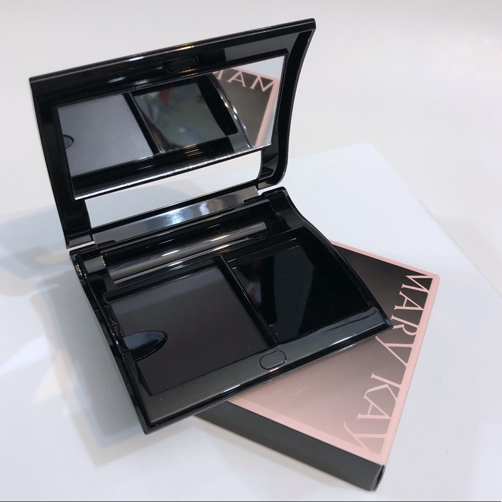 Discontinued Mary Kay refillable compact (empty).